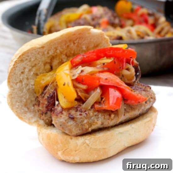Hearty Italian Sausage and Pepper Skillet 2 Italian Sausage with Bell Peppers and Onions in a serving bowl