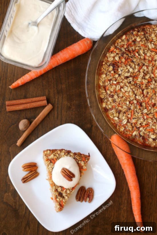 Carrot Cake Baked Oatmeal with Cream Cheese Frosting 4 Overhead photo of Carrot Cake Baked Oatmeal on a white plate.
