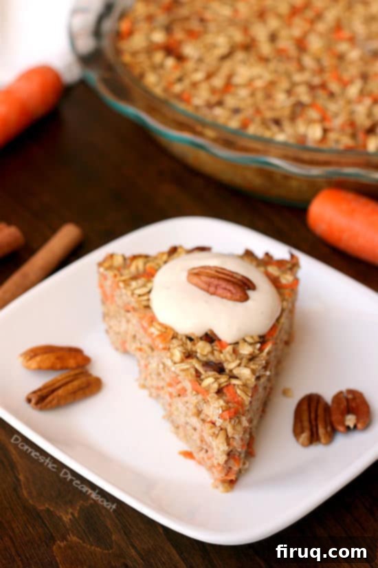 Carrot Cake Baked Oatmeal with Cream Cheese Frosting 5 Carrot Cake Baked Oatmeal with Cream Cheese Topping on a white plate.