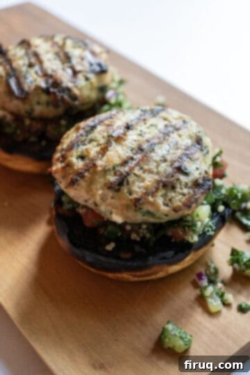 The Olympian Chicken Burger 11 Chicken burger on the tabbouleh on the bun.