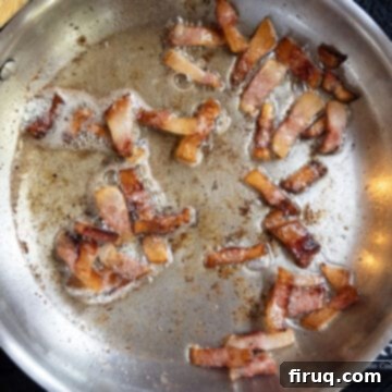Roman Guanciale Pasta 6 Frying guanciale in a pan.