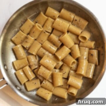 Roman Guanciale Pasta 10 The sauce is emulsified and removed from the heat.
