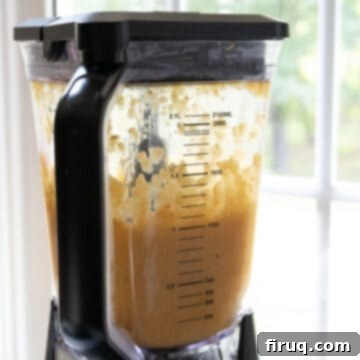 Velvety Potato and Onion Embrace 9 Half of the soup blended in the blender.