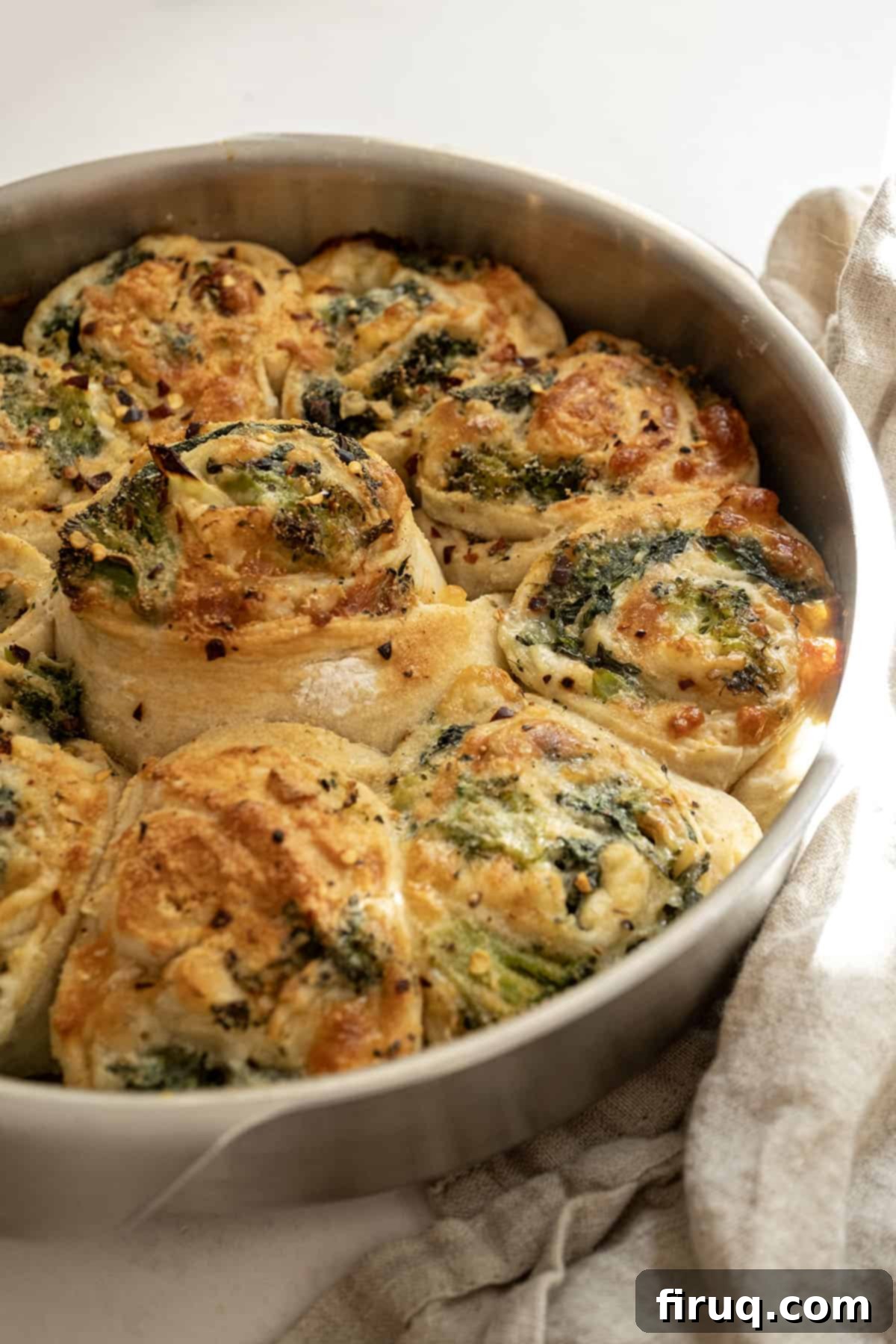 Garden Fresh Stromboli 10 Beautifully baked veggie pinwheels in a cake pan, ready to serve.
