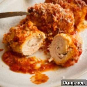 Chicken Rollatini 14 Chicken rollatini cut open with ricotta filling inside.
