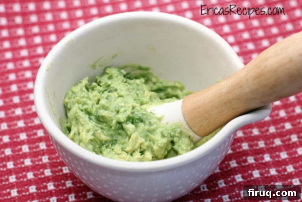 Avocado Heaven 2 Freshly made guacamole in a bowl with tortilla chips