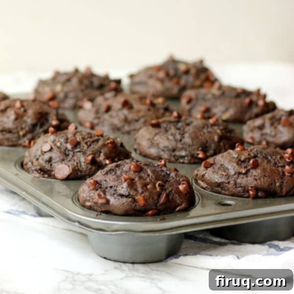 Healthier Double Chocolate Zucchini Muffins Double Chocolate Zucchini Muffins - Domestic Dreamboat #chocolate #healthier
