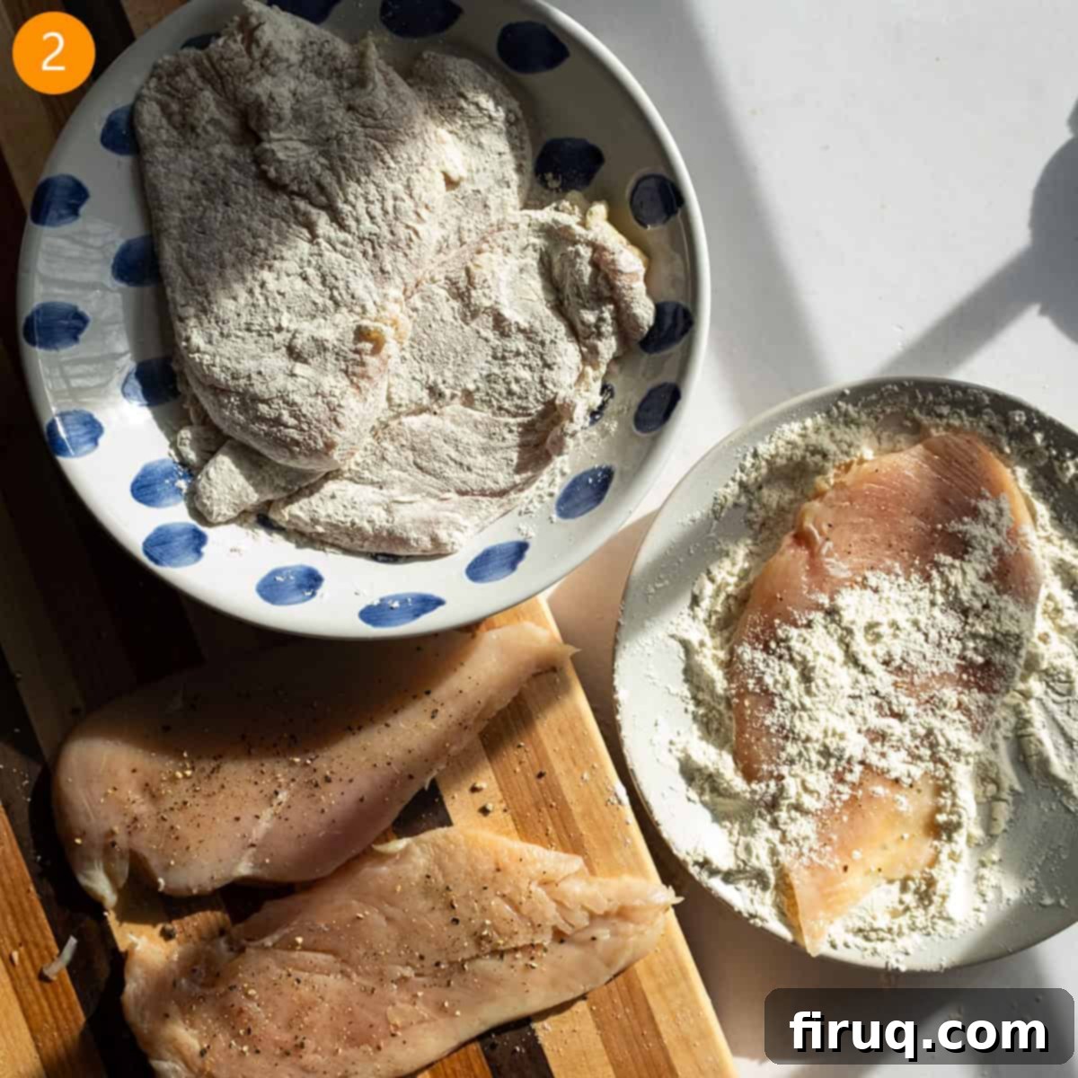 Perfect Homemade Chicken Piccata 5 Dredging chicken breast in flour on a plate.