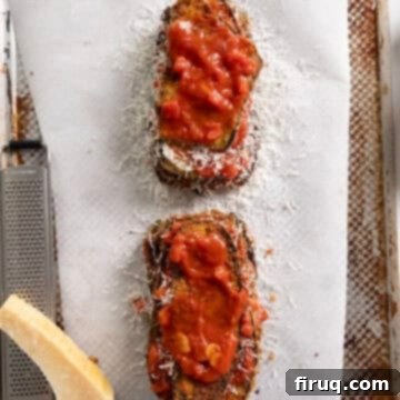 Eggplant Parmesan Sandwich 9 Eggplant piled into layers of eggplant, marinara, and parmesan.