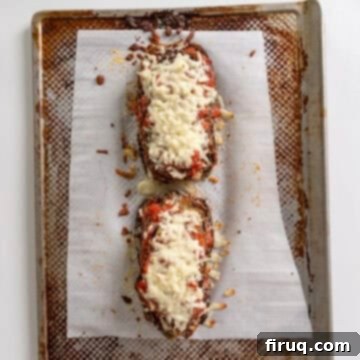 Eggplant Parmesan Sandwich 10 Eggplant layers topped with mozzarella and parmesan, toasted in the oven.