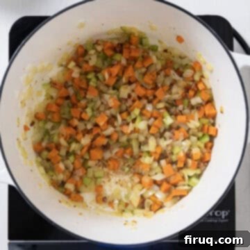 Hearty Italian Pasta and Bean Soup 5 Sofrito sauteing in the dutch oven.