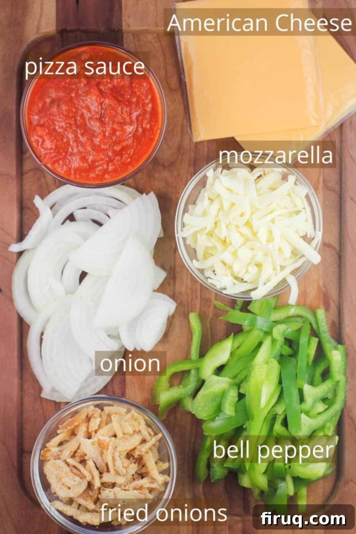 Chili Cheeseburger Pizza 4 recipe ingredients on board and labeled: pizza sauce, american cheese, mozzarella, onion, bell pepper, and fried onions