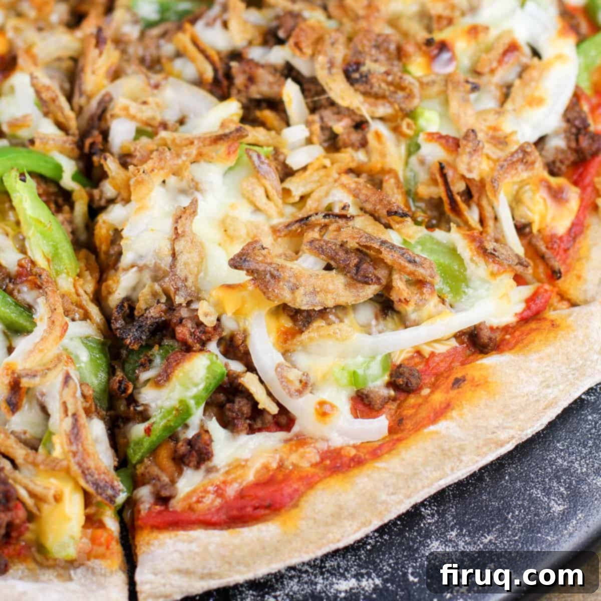 Chili Cheeseburger Pizza 10 slice of chili cheeseburger pizza on pizza stone