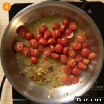Effortless Eggplant and Tomato Pasta 7 Cherry Tomatoes and white wine added to pan to simmer with garlic.