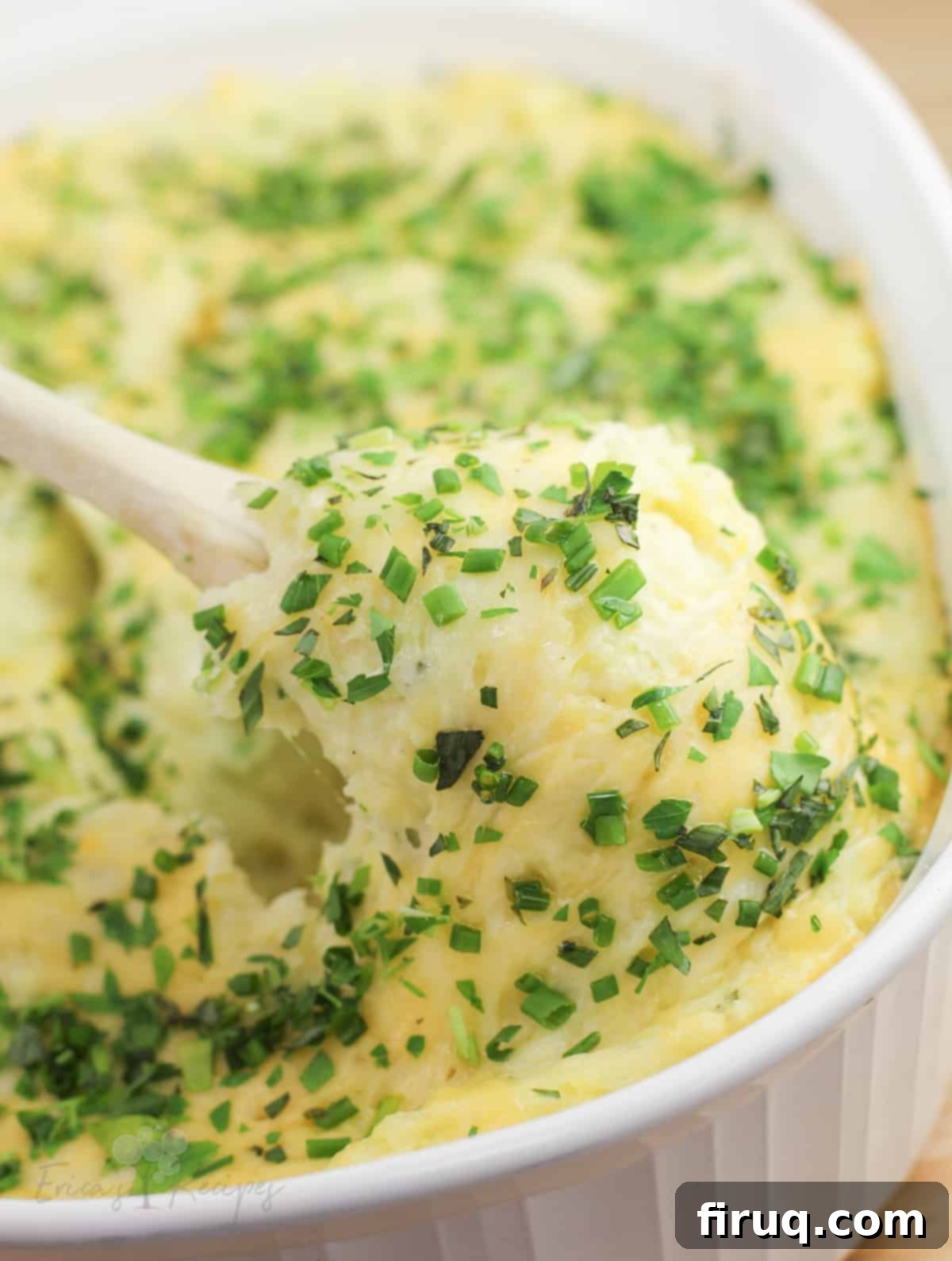 Garlicky Gruyere and Gouda Mashed Potatoes 13 spoon lifting cooked mashed potatoes