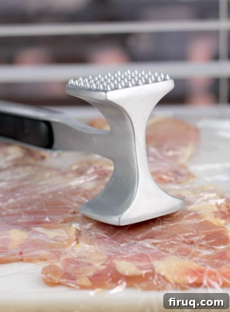 Gourmet Prosciutto-Wrapped Boursin Chicken 4 mallet pounding chicken flat