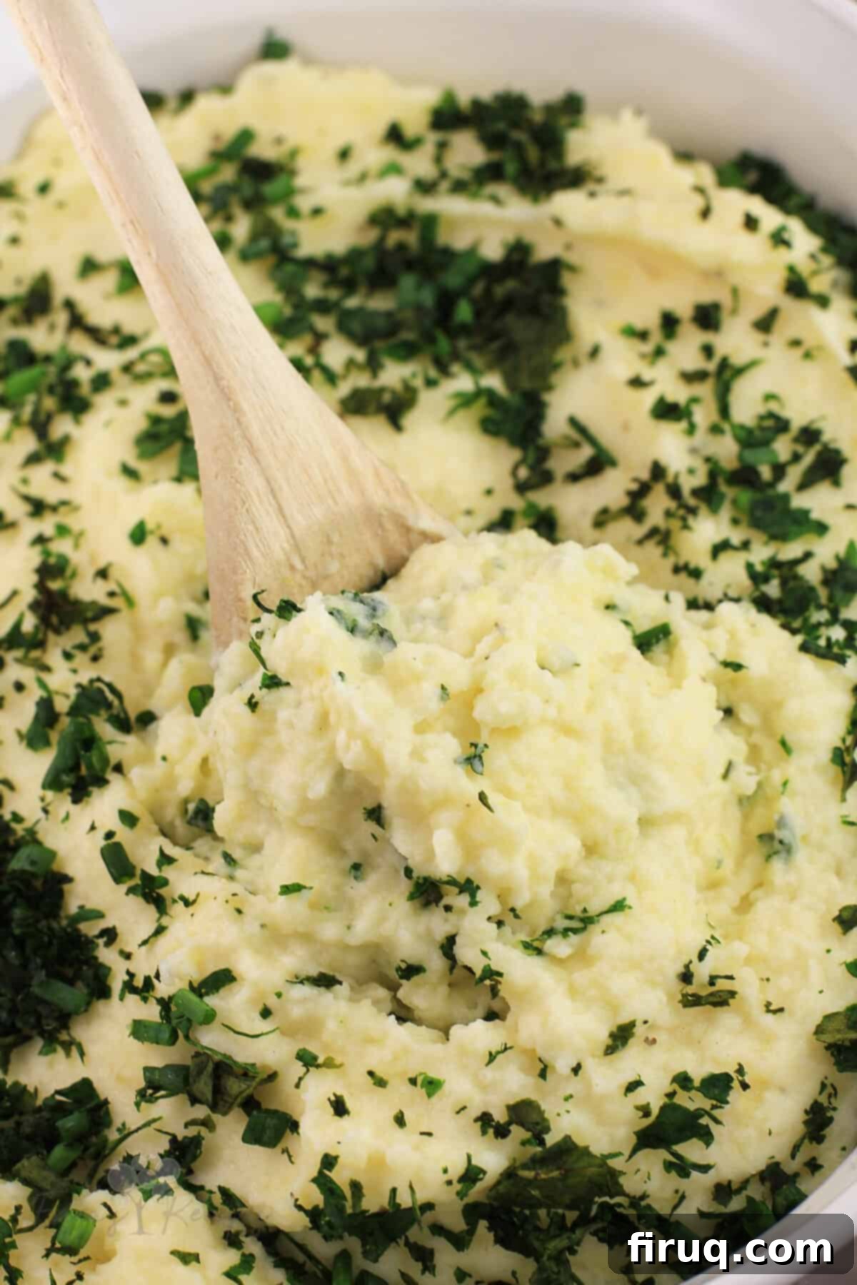 Decadent Boursin Mashed Potatoes 3 wood spoon with boursin cheese potatoes