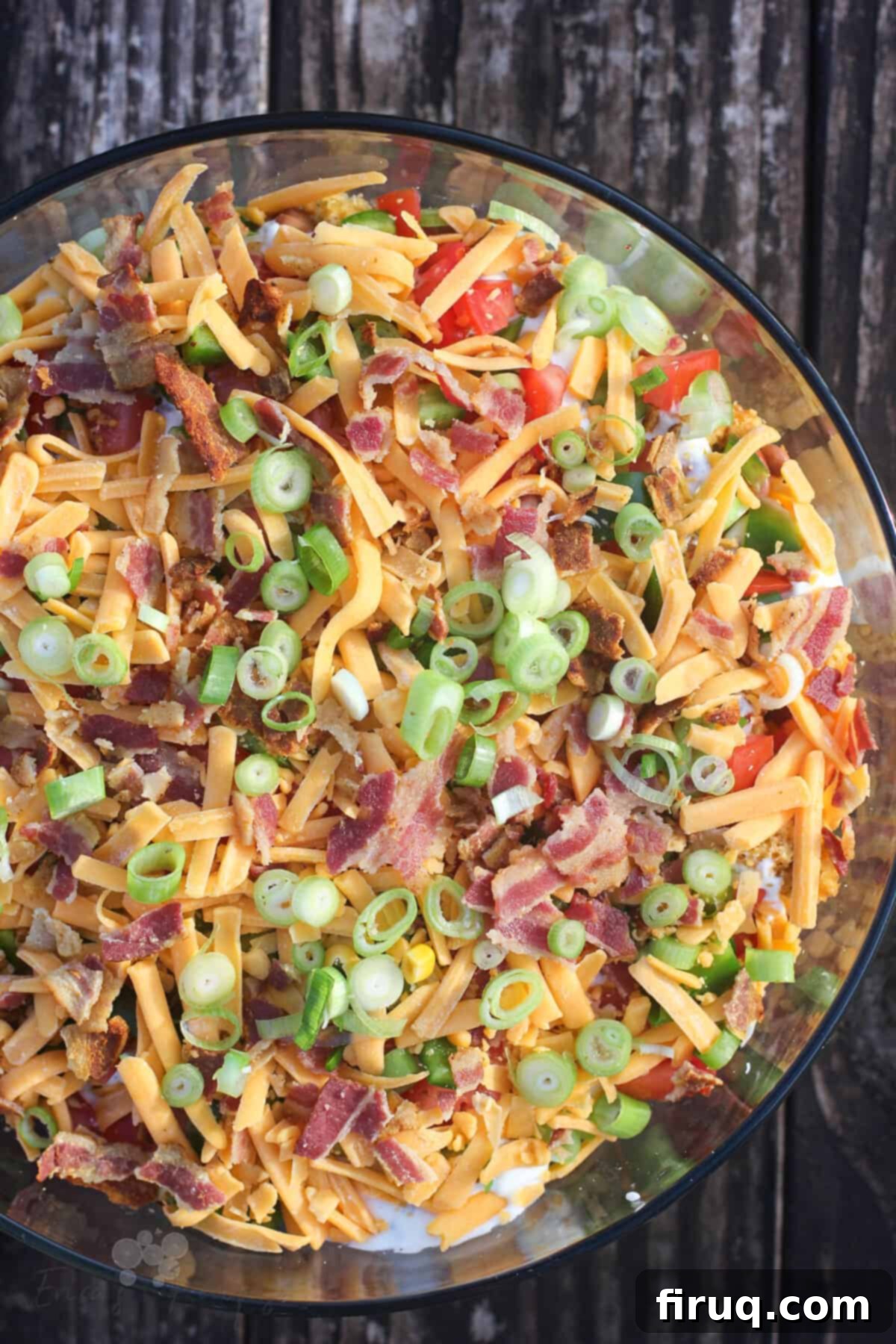 Southern Cornbread Layers 2 top down view into glass bowl with jalapeno cheddar cornbread salad