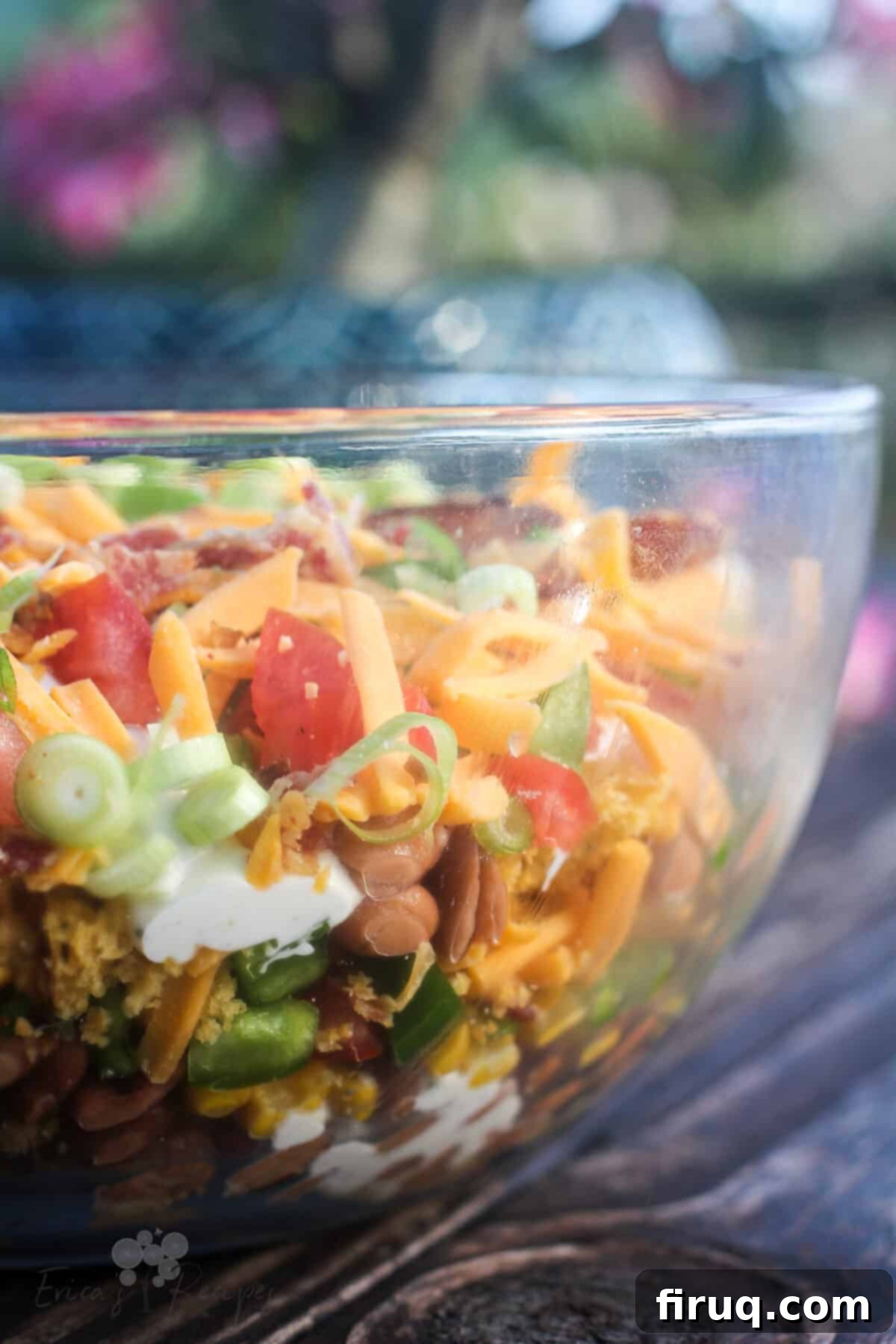 Southern Cornbread Layers 7 side view into glass bowl showing layers of cornbread salad