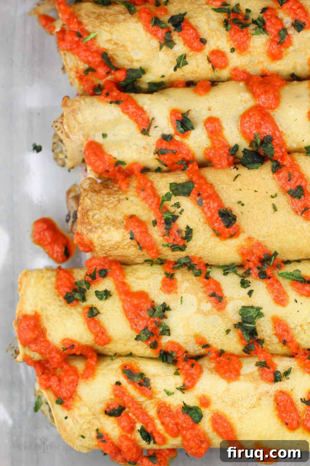 Savory Pesto Chicken Crepes 9 finished crepes in bake dish