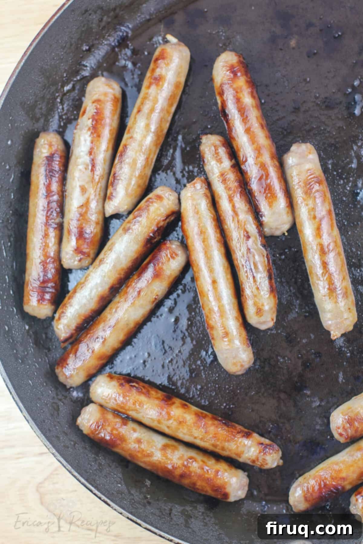 Cinnamon Swirl Sausage Bites 4 Cooked breakfast sausage links in a skillet.