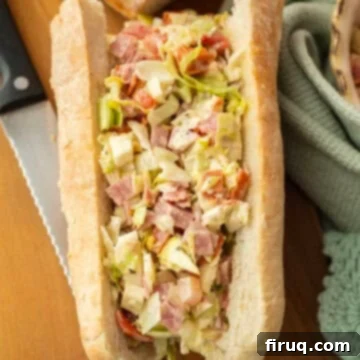 Chopped Italian Sub 7 Chopped Italian salad in a sandwich.