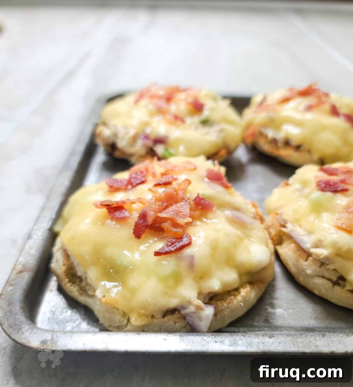 Crispy Bacon Tuna Melt 5 tuna melts on bake sheet topped with bacon