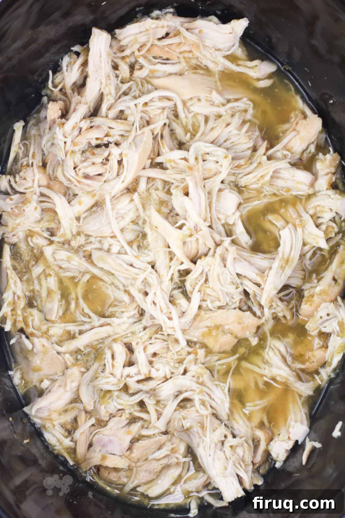 Easy 2-Ingredient Salsa Verde Chicken 2 shredded salsa verde chicken in slow cooker