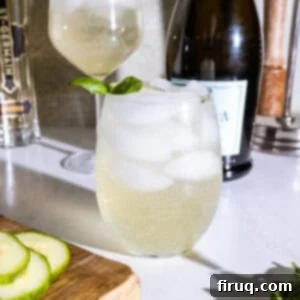 St Germain Basil Cucumber Cooler 5 St germain spritz with cucumber and basil garnish.