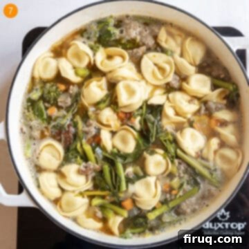 Savory Broccoli Rabe & Tortellini Bowl 10 Tortellini being added to the simmering Broccoli Rabe and Sausage Soup, cooking until al dente.