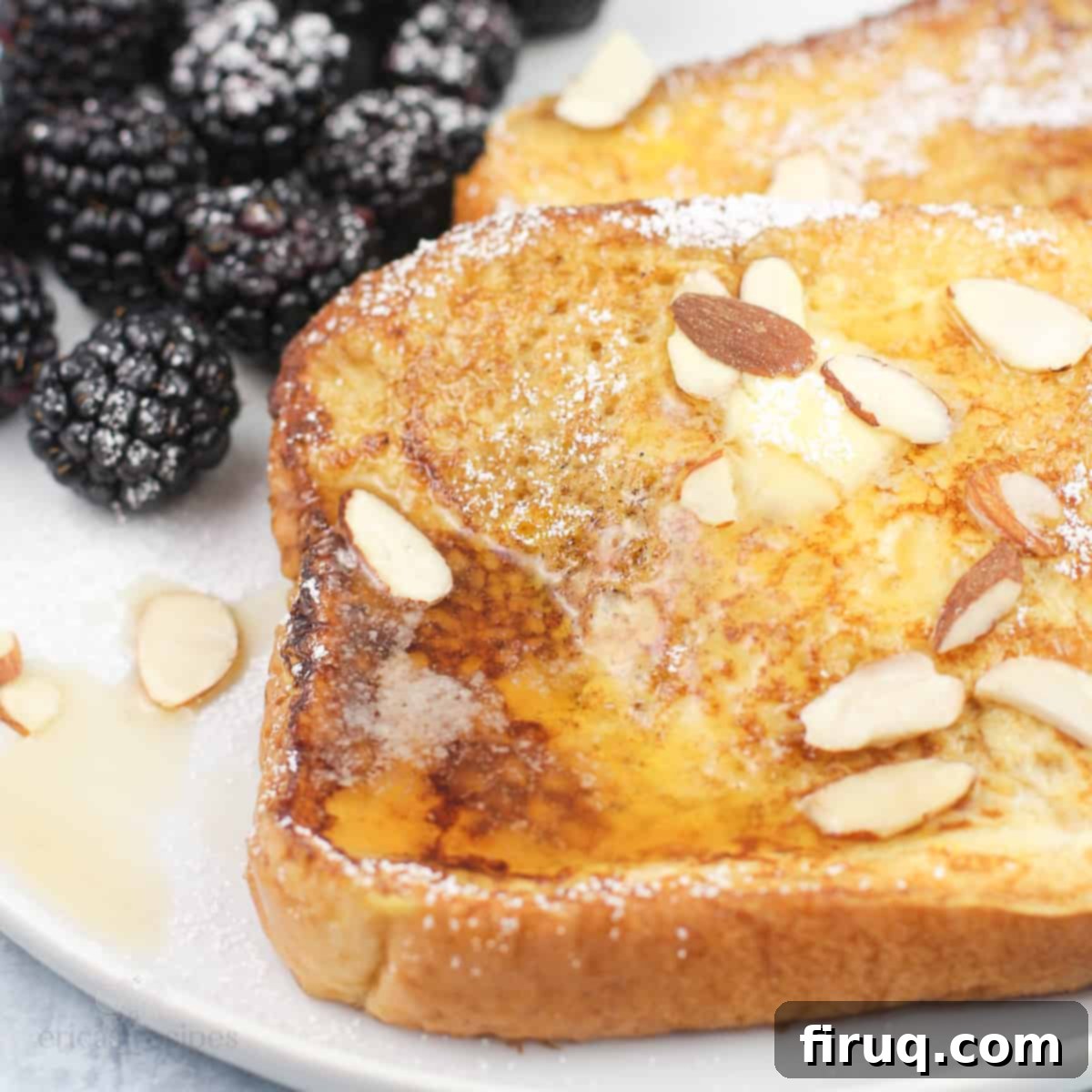 Blackstone Amaretto French Toast 9 Blackstone French toast with amaretto on white plate with blackberries