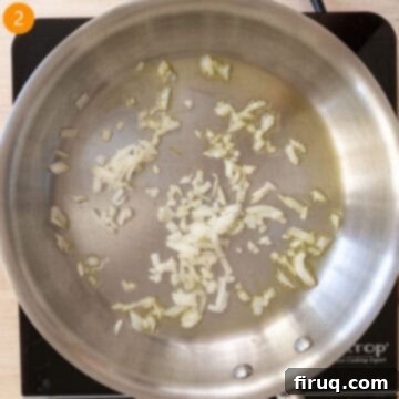 Mushroom Gorgonzola Risotto 5 Shallots being sautéed in olive oil in a large pan until softened.
