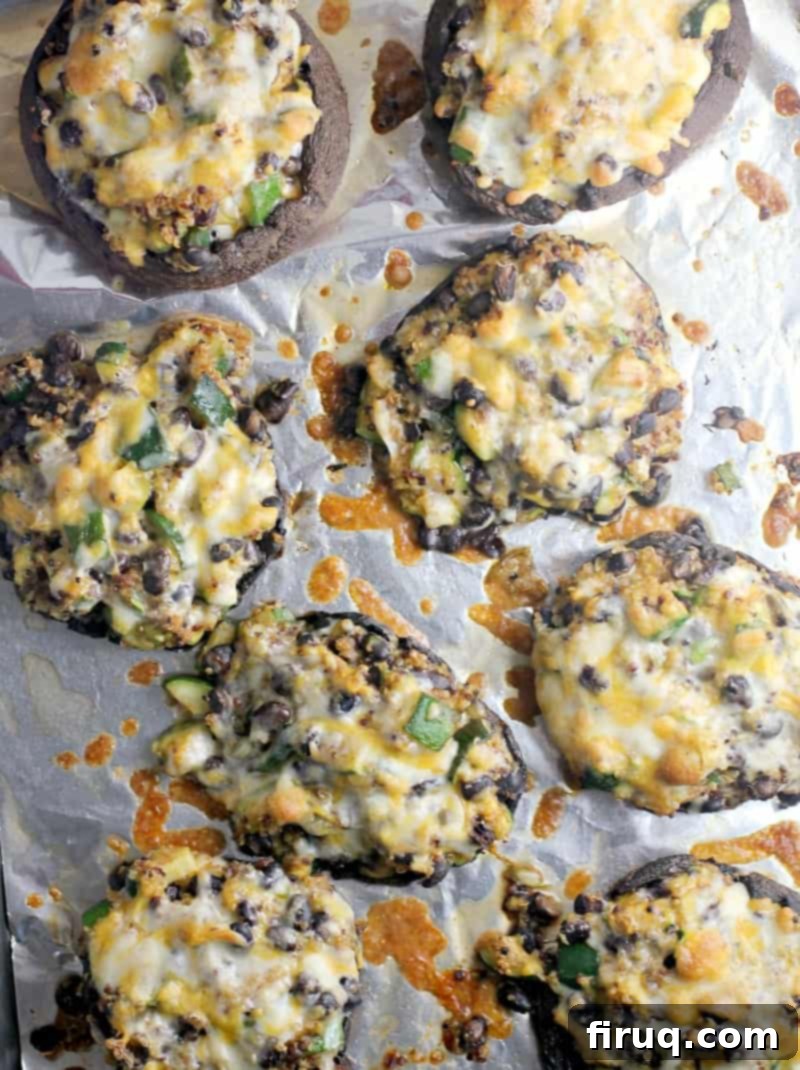 Zesty Mexican Quinoa Portobello Boats 9 top down view of cooked mushrooms on a bake sheet