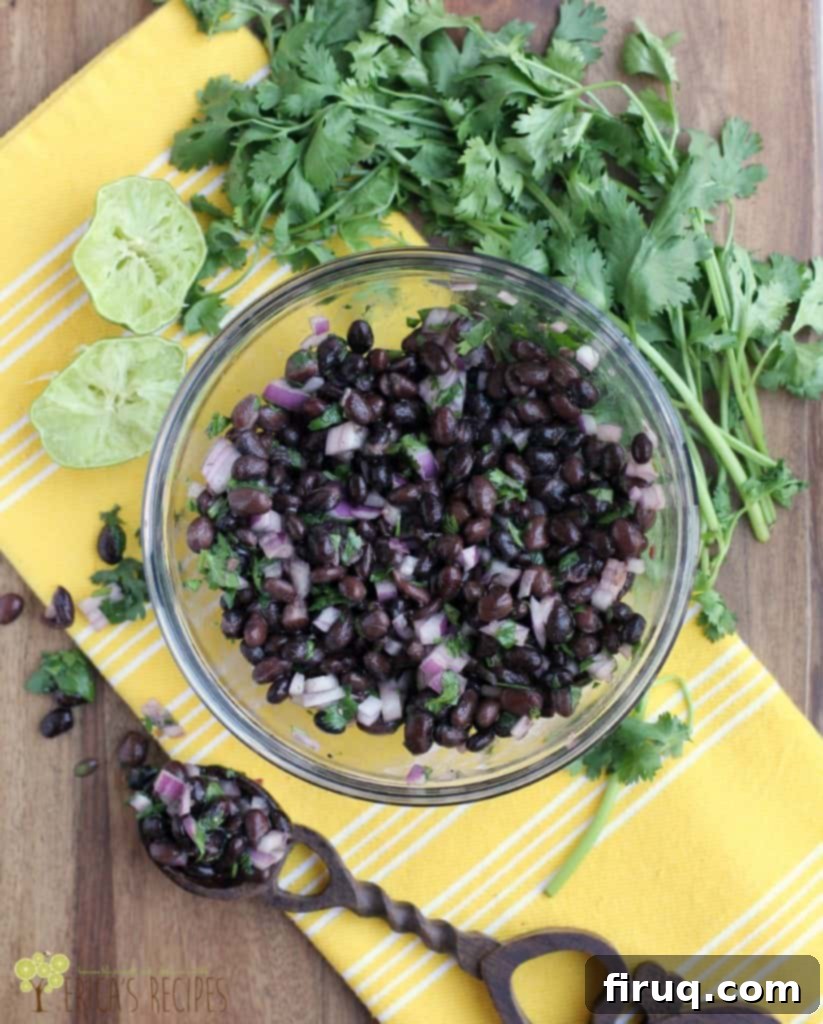 Zesty Black Bean Medley 2 Vibrant Black Bean Salad with fresh cilantro and lime, ready to be served