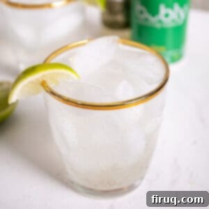 Refreshingly Crisp Alcohol-Free Moscow Mule 5 Non alcoholic moscow mule in a glass, garnished with a lime.