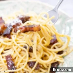 The Ultimate Carbonara Do's and Don'ts 19 Authentic Spaghetti Carbonara with a creamy sauce and crispy guanciale, ready to be served.