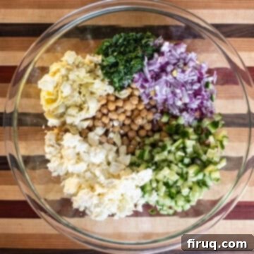 Mediterranean Chickpea Feta Salad 4 Ingredients combined in a bowl.