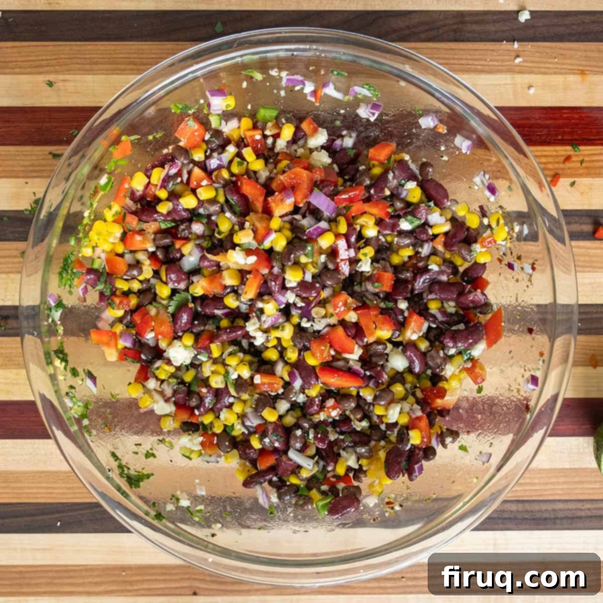 Tex-Mex Treasure Salad 6 A close-up shot of the fully mixed and perfectly coated Cowboy Caviar Salad in a large serving bowl, highlighting the creamy texture and the harmonious integration of all the fresh ingredients.