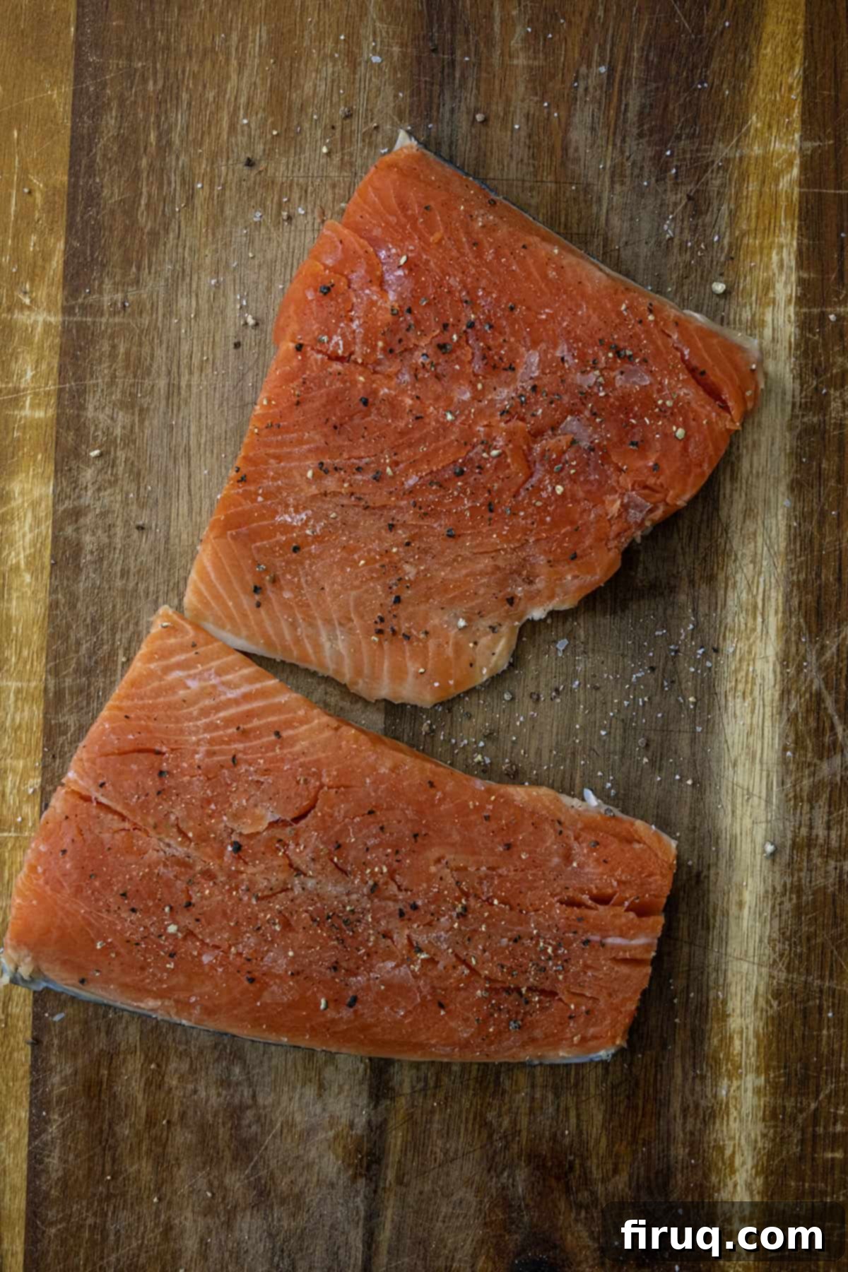 Perfectly Seared Cast Iron Lemon Dill Salmon 3 Seasoning salmon fillets with salt and pepper