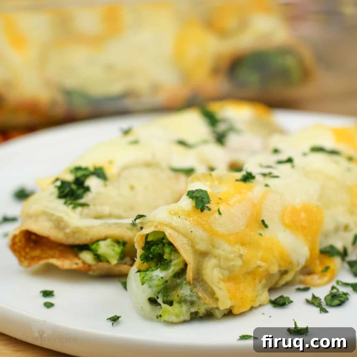 Beer-Infused Broccoli Cheese Crepes 2 two crepes on white dish.