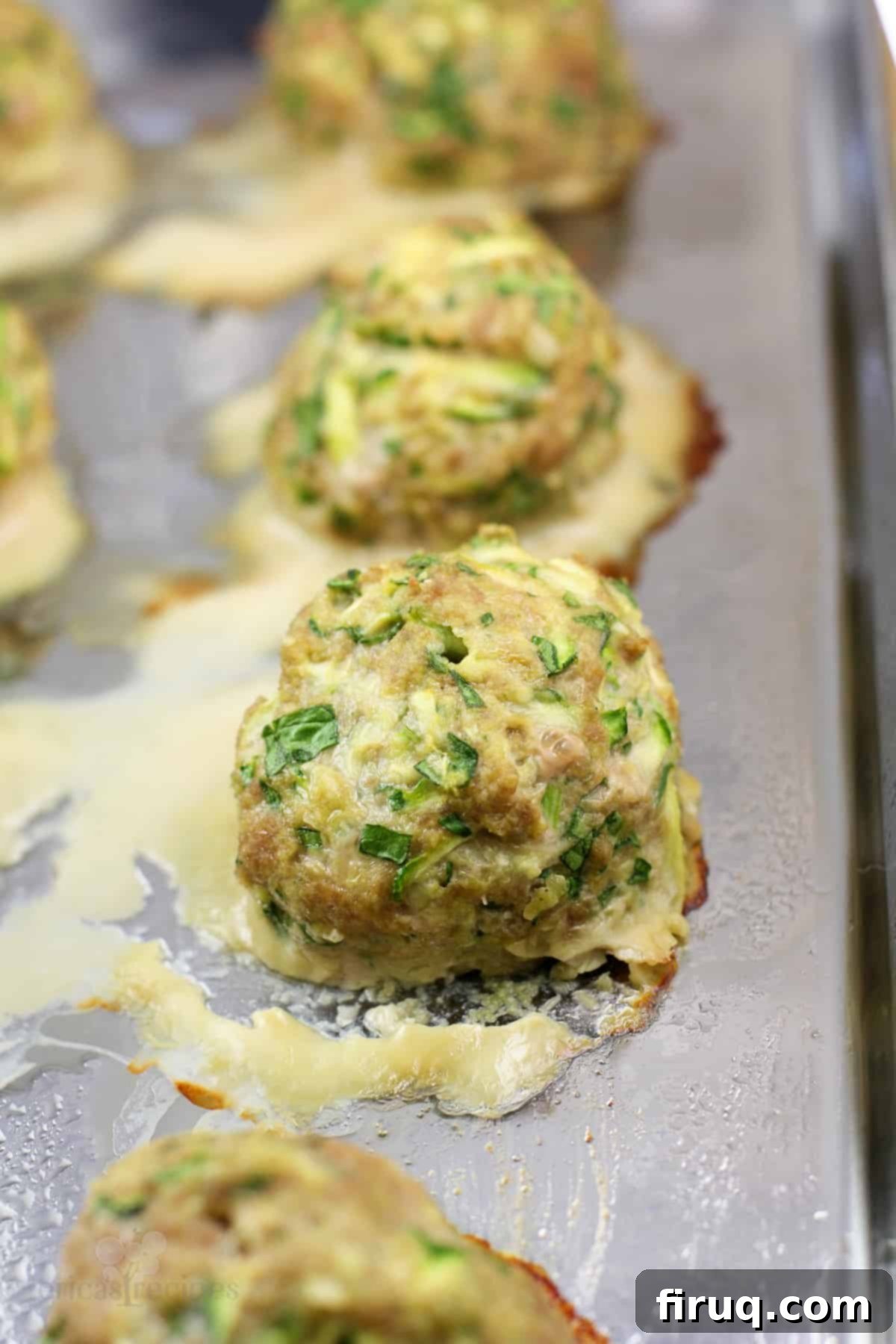 Wholesome Turkey Zucchini Meatballs 6 cooked meatball on bake sheet