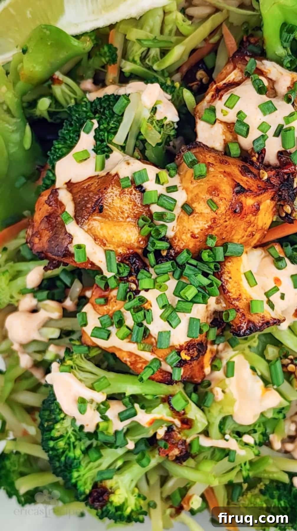 Easy Firecracker Salmon Meal Prep Bowls 3 Close-up of freshly cooked firecracker salmon pieces with a vibrant marinade glaze.