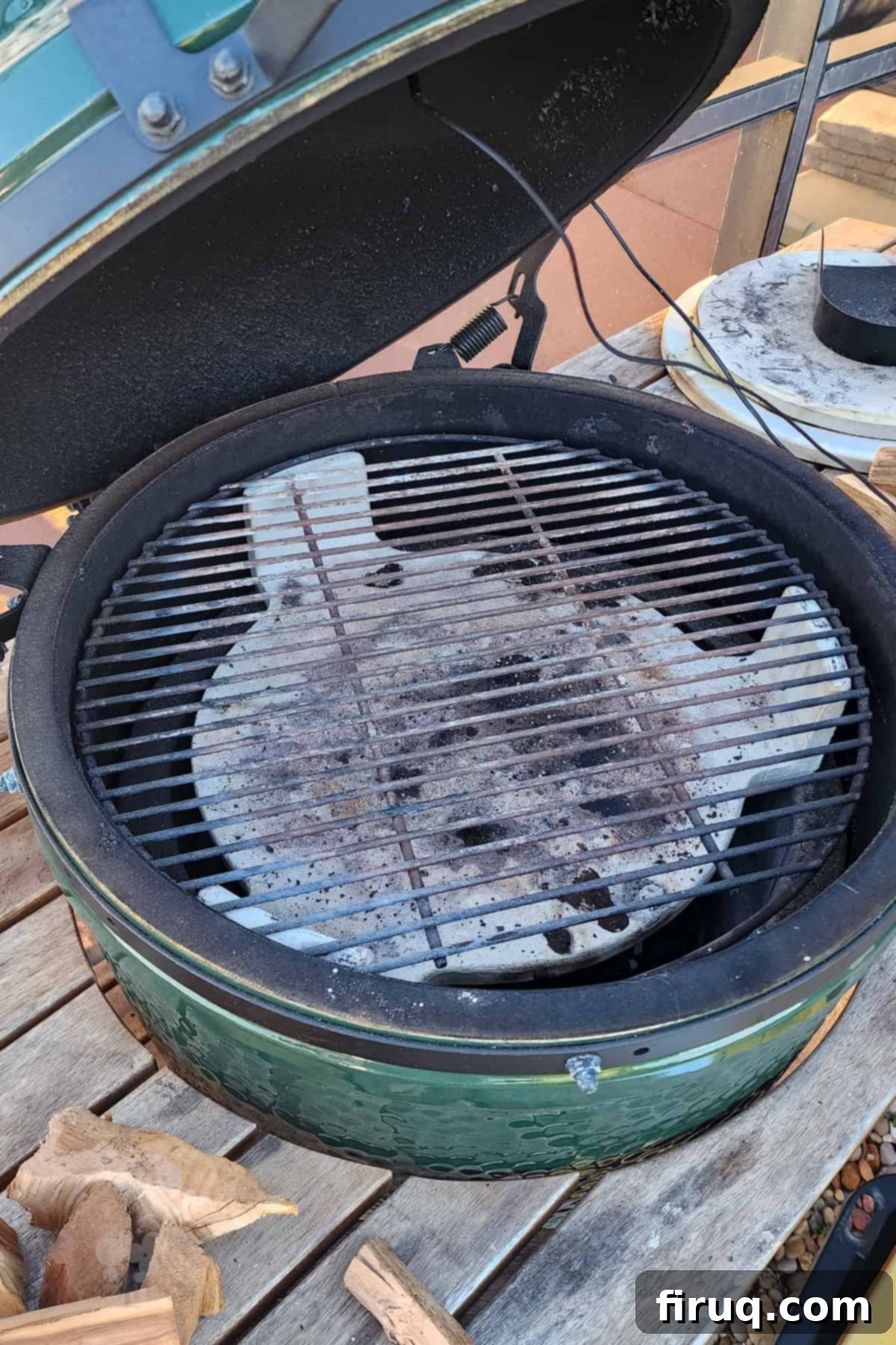 The Ultimate Juicy Smoked Pulled Pork from Your Big Green Egg 4 Inside view of Big Green Egg with plate setter for indirect cooking