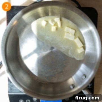 Classic Fettuccine Alfredo 5 Melting unsalted butter in a large saucepan over medium heat.
