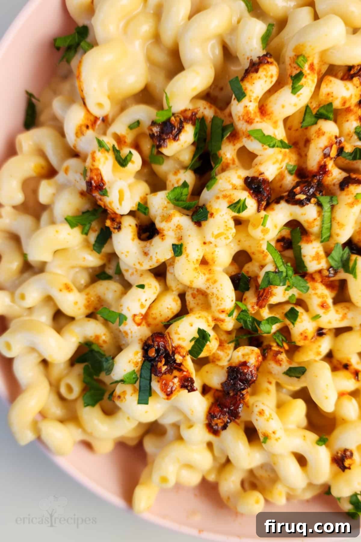 Cottage Comfort Mac 3 A close-up view of the golden, creamy macaroni and cheese, showing its luscious texture and perfectly cooked pasta.