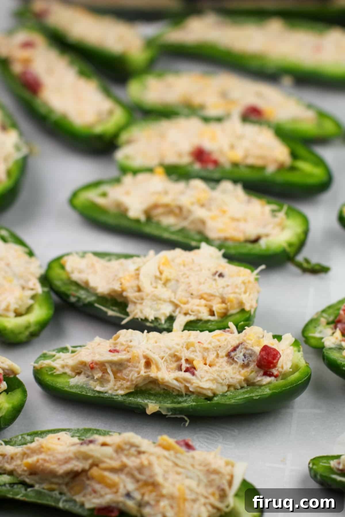 Cajun Crab-Bacon Blasters 5 stuffed jalapeno halves on bake sheet prior to cookin