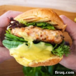 Gourmet Gorgonzola Grilled Chicken Burger 10 Grilled chicken burger on a bun with garlic aioli, ready to eat.