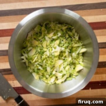 Brussels Sprout Salad with Crispy Pancetta 7 Shredded brussels sprouts in a bowl.