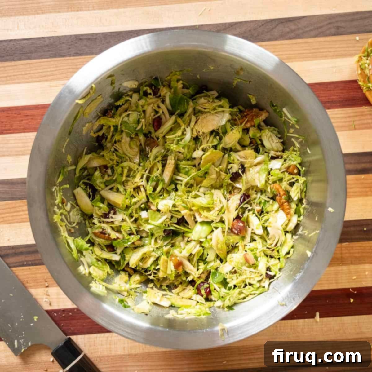 Brussels Sprout Salad with Crispy Pancetta 9 Combining the salad with dressing.