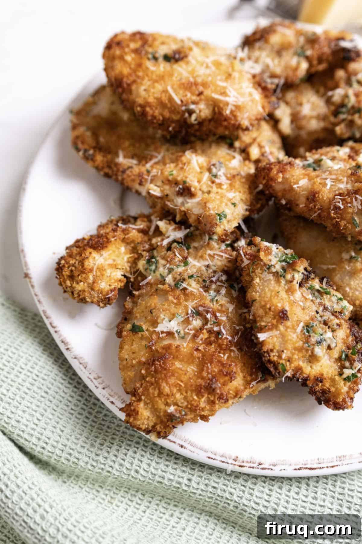 Ultimate Air Fryer Parmesan Chicken 2 Air fried chicken in a garlic sauce.
